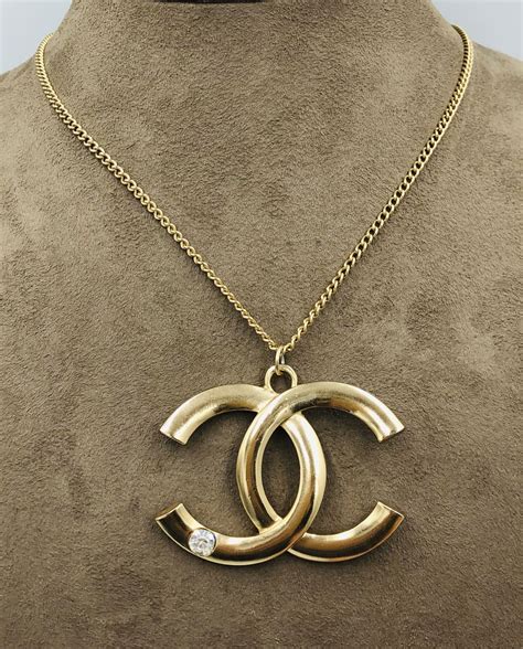 chanel gold logo pendant|Chanel necklace logo cheap.